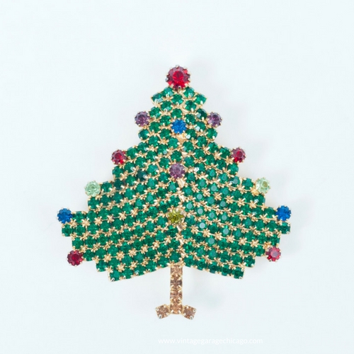 vintage Christmas Jewelry. 1970s Rhinestone Christmas tree brooch by Hobe at the Chicago Vintage Clothing and Jewelry show event. Edgewater, February.